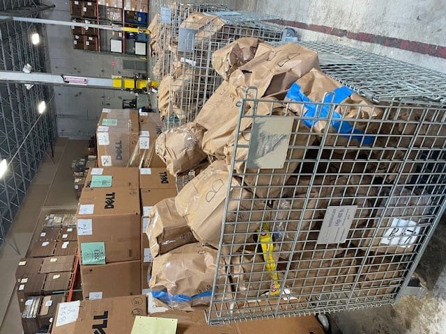 Bins holding wrapped toys donated by the community